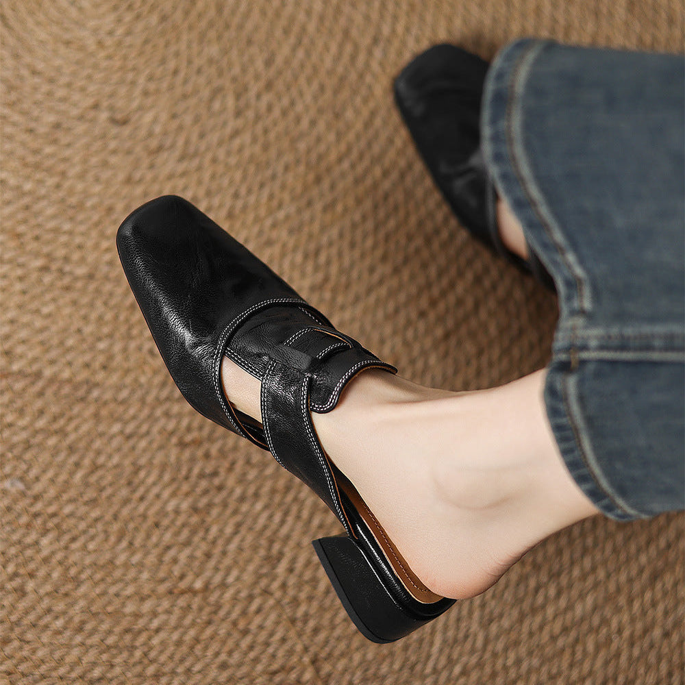 Brea | Mules in vera pelle con tagli asimmetrici