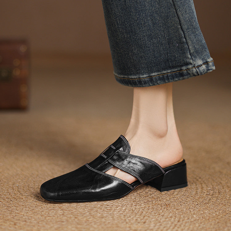 Brea | Mules in vera pelle con tagli asimmetrici