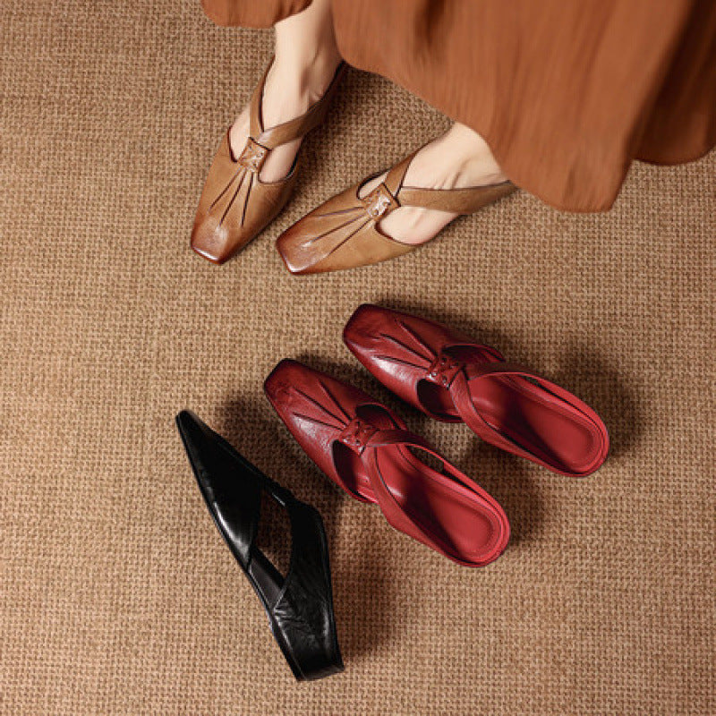 Gianna | Mules in vera pelle con fasce a X