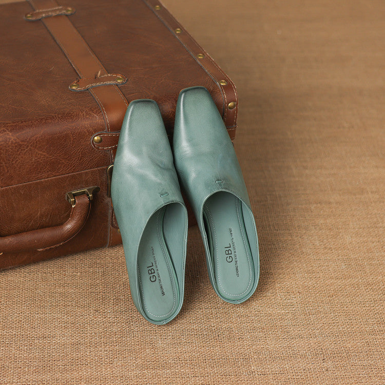 Kessa | Mules in vera pelle con zeppa
