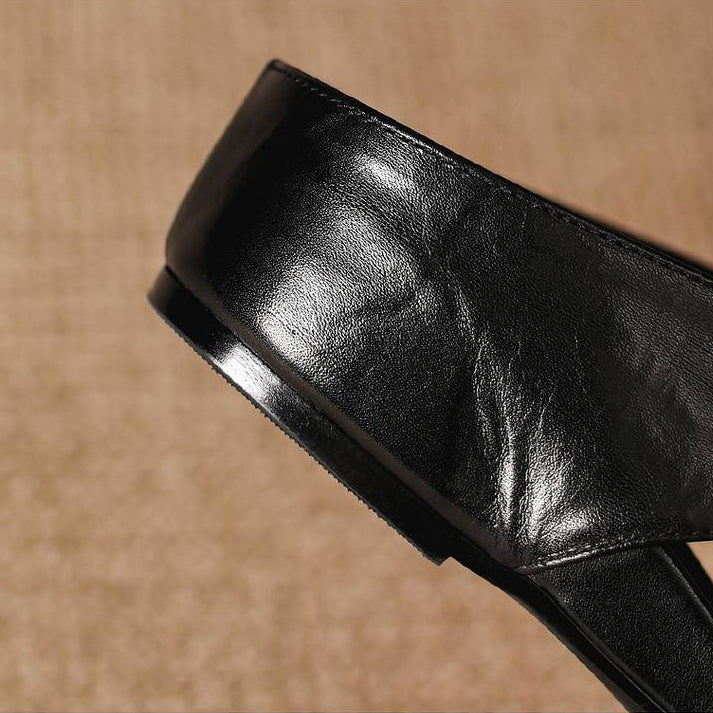 Gianna | Mules in vera pelle con fasce a X