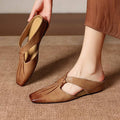 Gianna | Mules in vera pelle con fasce a X