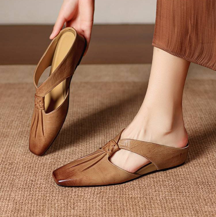 Gianna | Mules in vera pelle con fasce a X