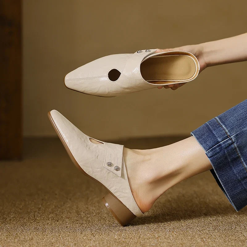 Olga | Mules in vera pelle con fascetta laterale