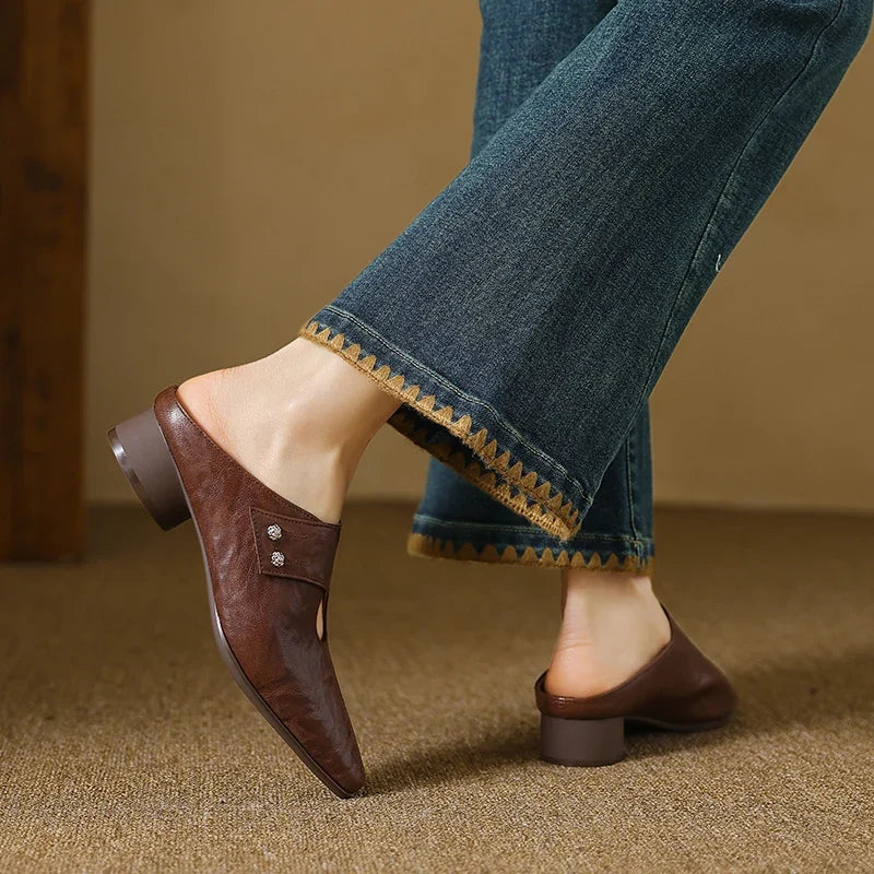 Olga | Mules in vera pelle con fascetta laterale