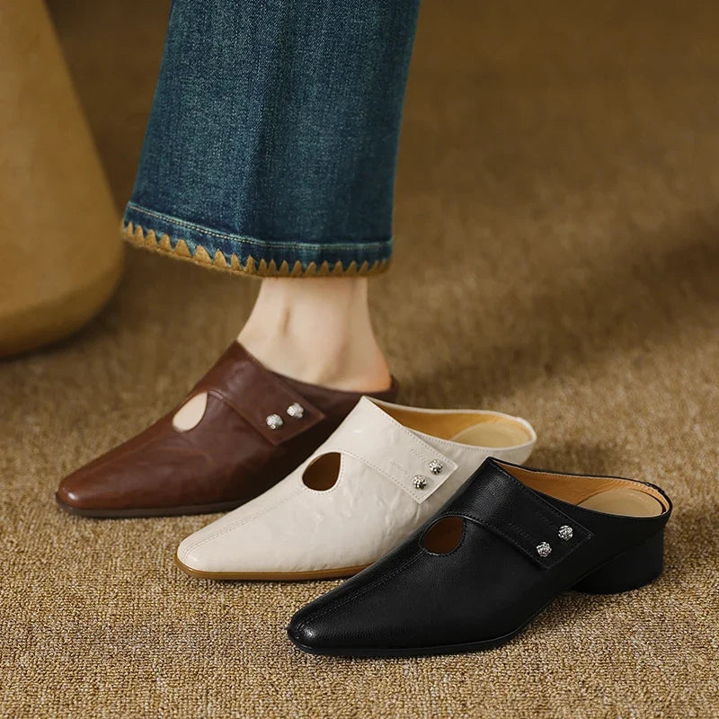 Olga | Mules in vera pelle con fascetta laterale