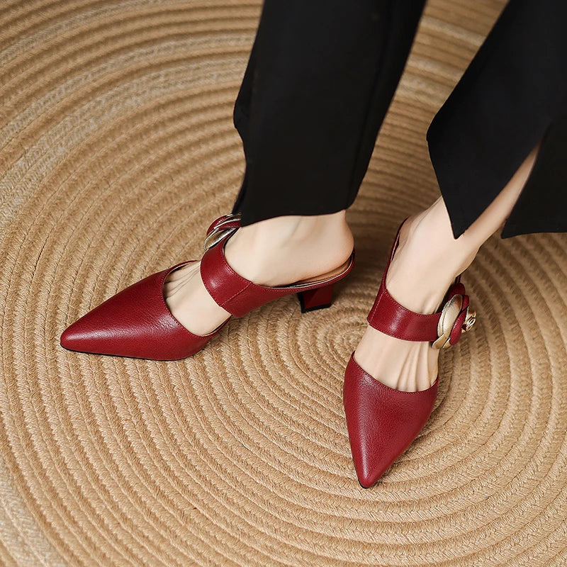 Pina | Mules in vera pelle con rosa applicata