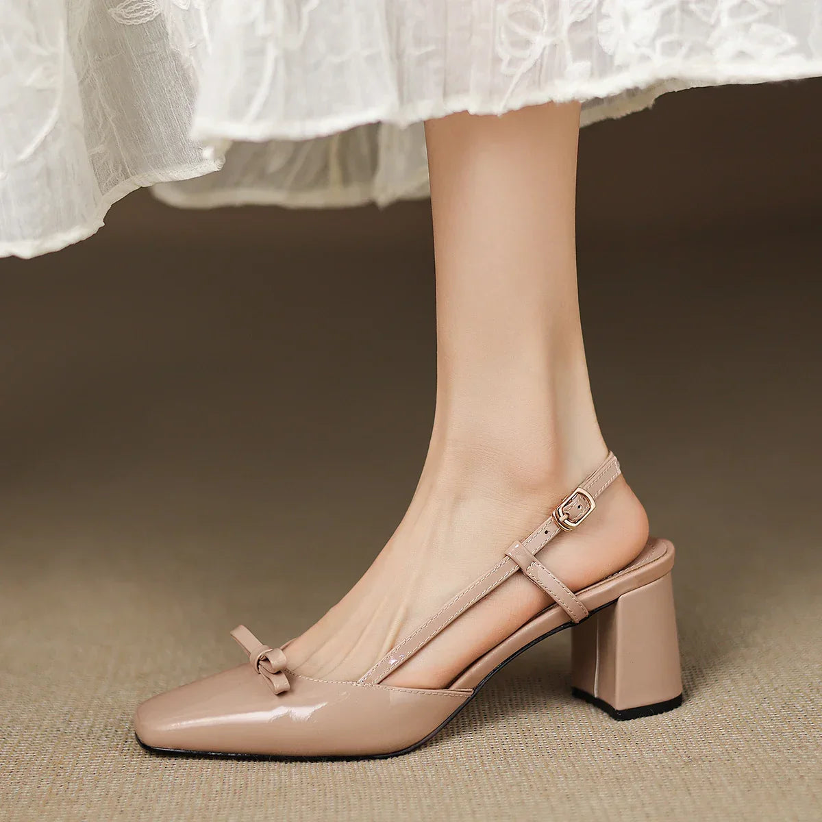 Milla | Décolleté slingback in vera pelle con fiocco