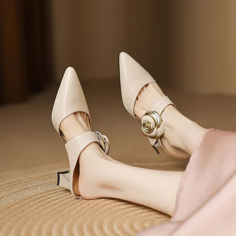 Pina | Mules in vera pelle con rosa applicata