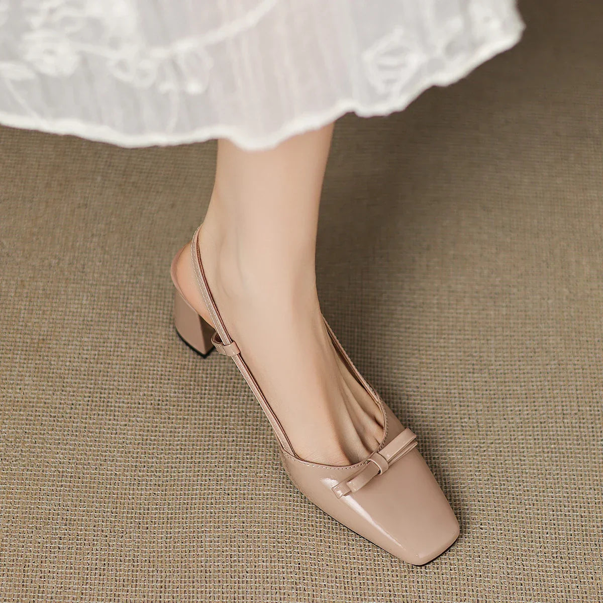 Milla | Décolleté slingback in vera pelle con fiocco