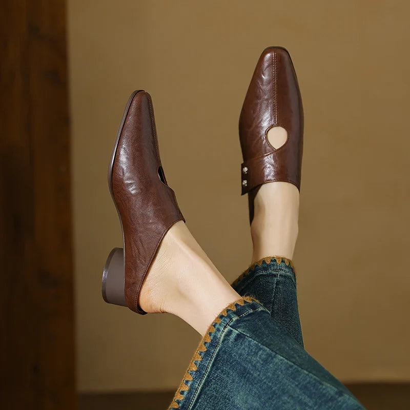 Olga | Mules in vera pelle con fascetta laterale