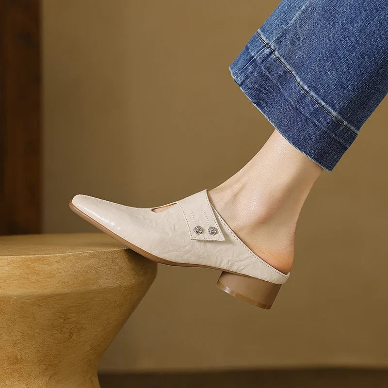 Olga | Mules in vera pelle con fascetta laterale
