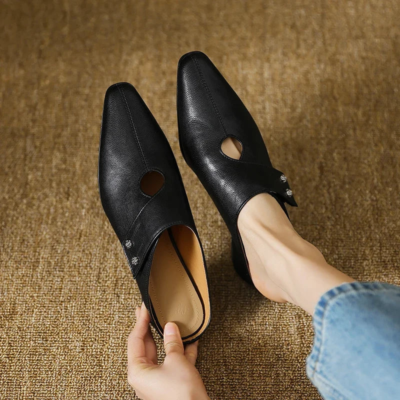 Olga | Mules in vera pelle con fascetta laterale