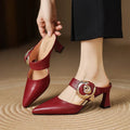 Pina | Mules in vera pelle con rosa applicata