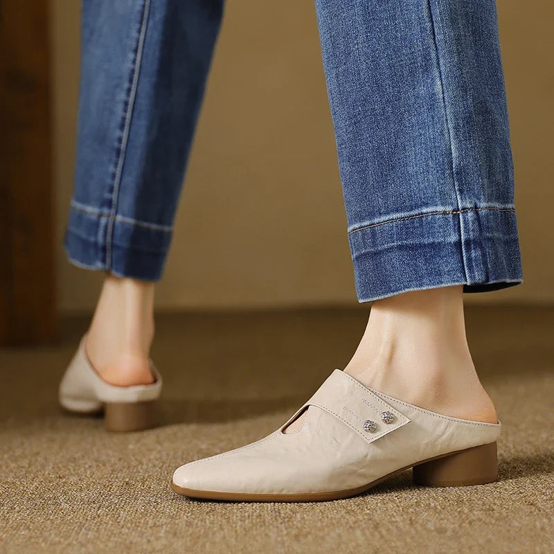 Olga | Mules in vera pelle con fascetta laterale