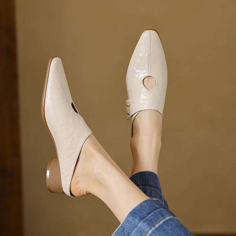 Olga | Mules in vera pelle con fascetta laterale