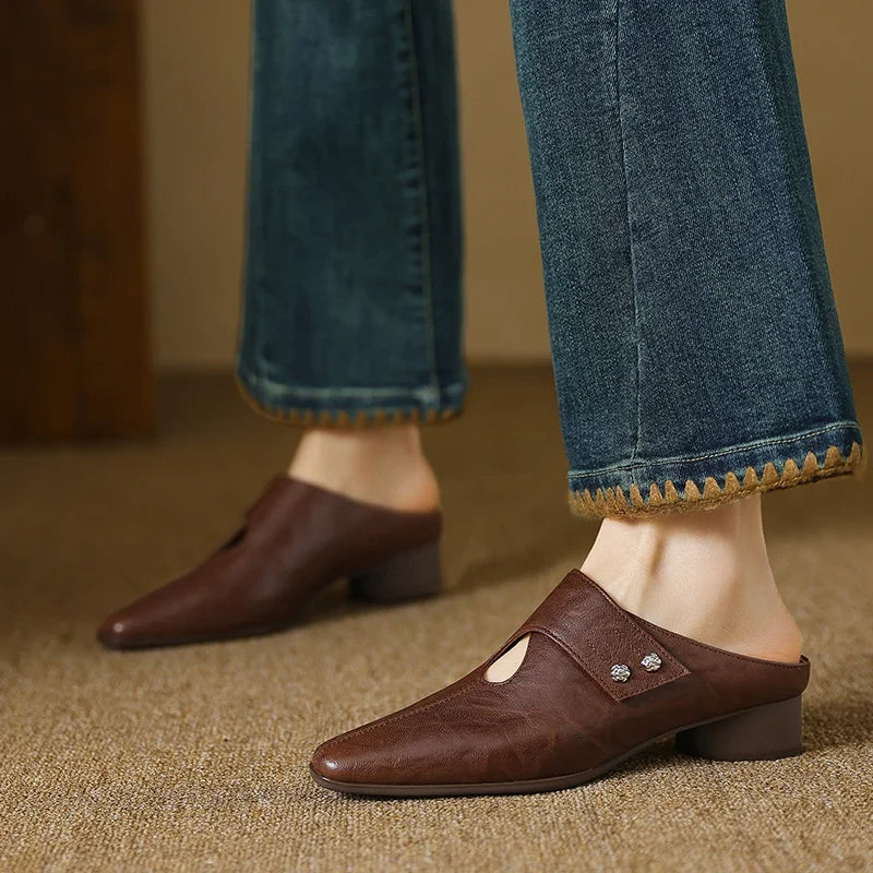 Olga | Mules in vera pelle con fascetta laterale