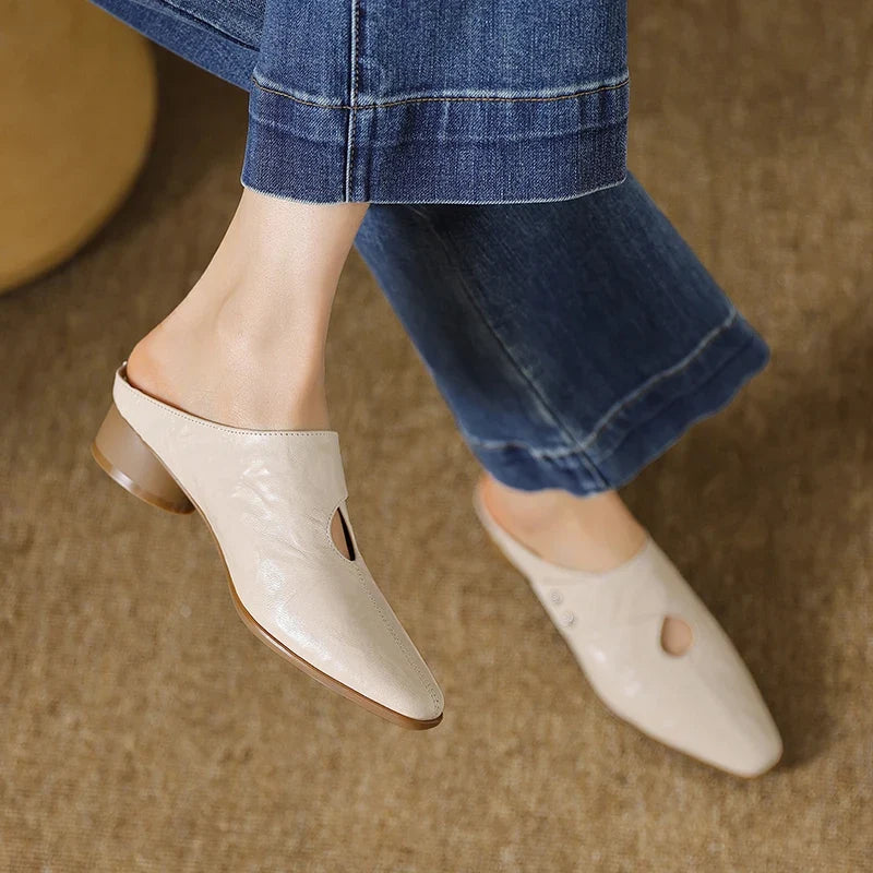 Olga | Mules in vera pelle con fascetta laterale