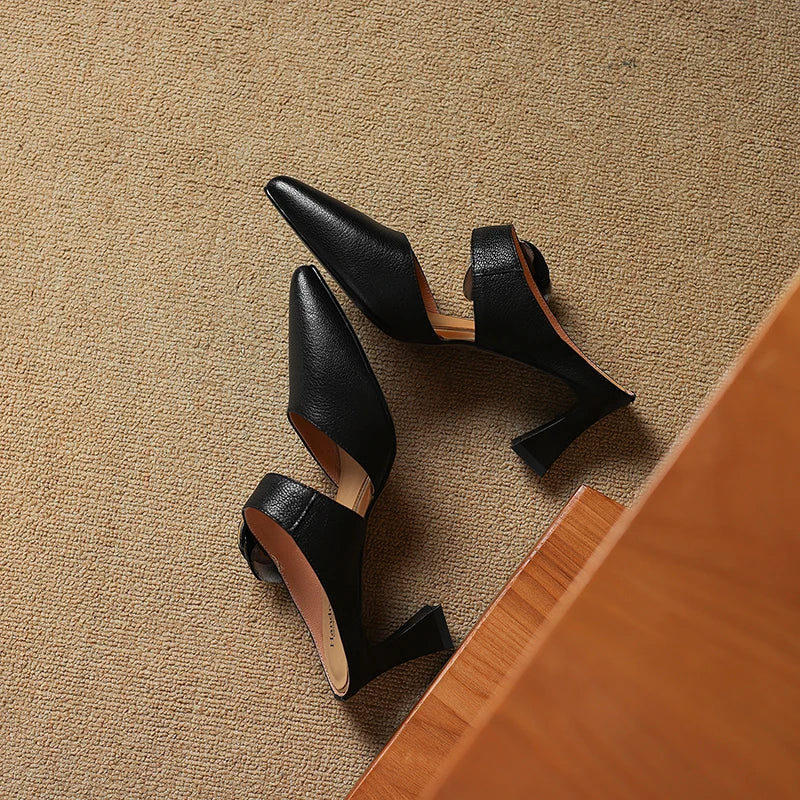 Pina | Mules in vera pelle con rosa applicata