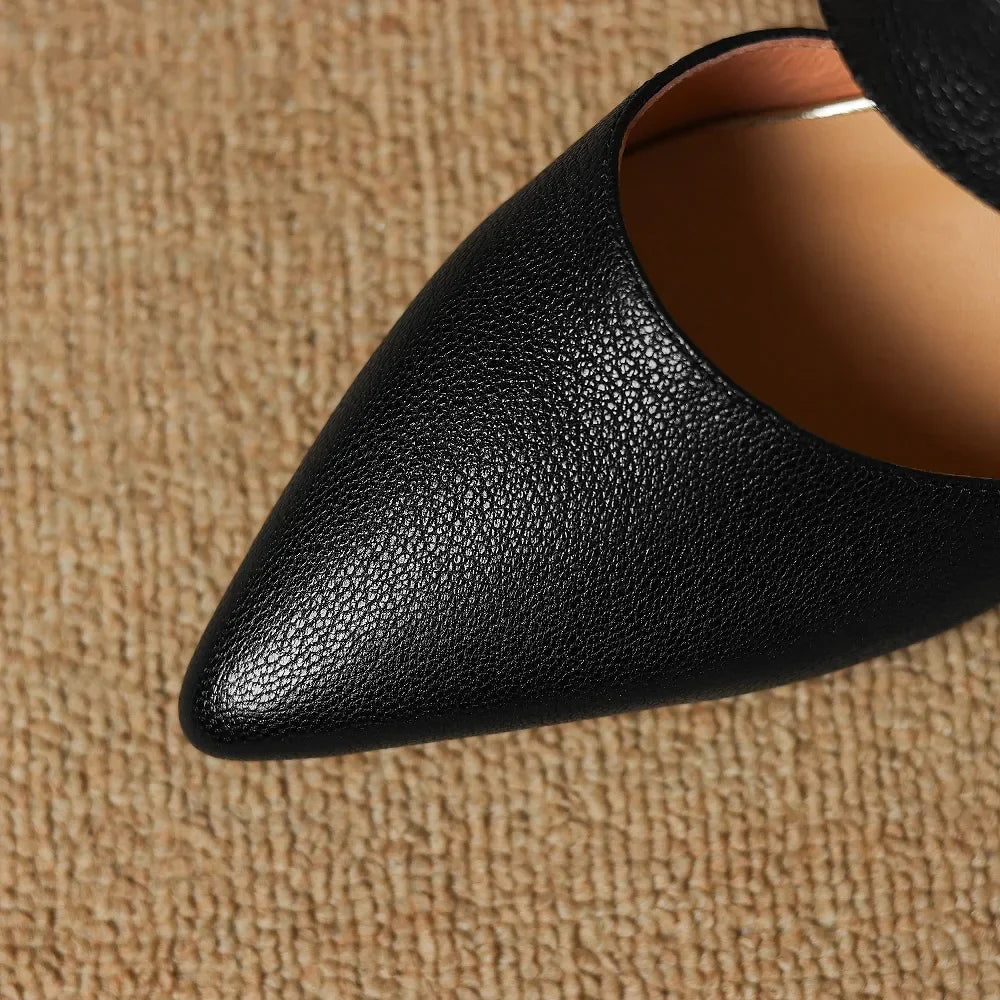 Pina | Mules in vera pelle con rosa applicata