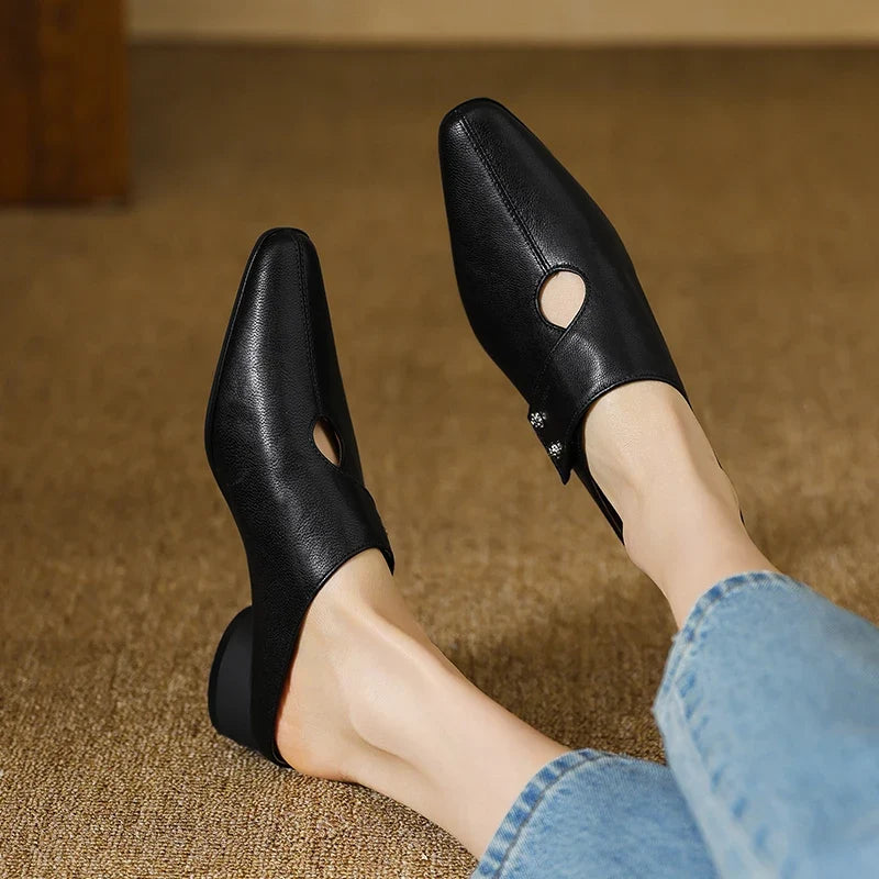 Olga | Mules in vera pelle con fascetta laterale