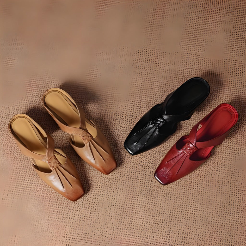 Gianna | Mules in vera pelle con fasce a X
