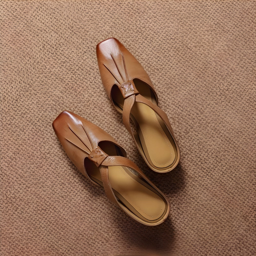 Gianna | Mules in vera pelle con fasce a X