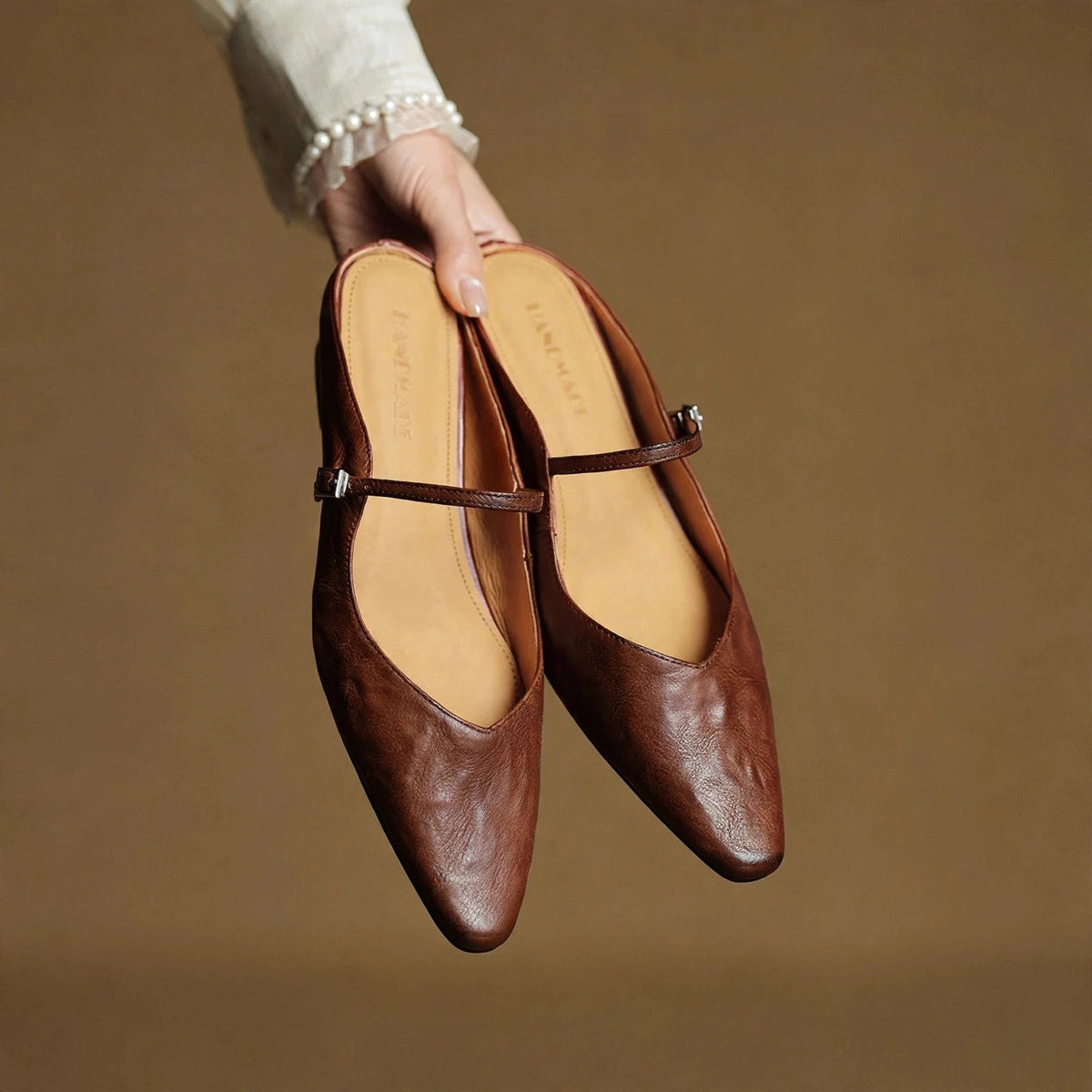 Thalia | Mules in vera pelle con cinturino