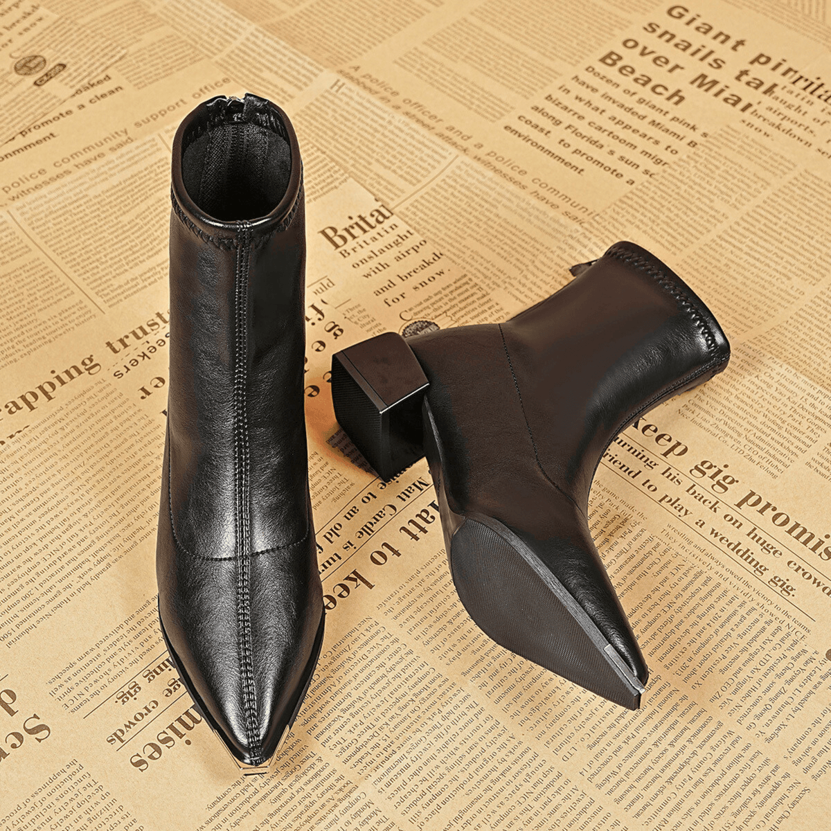 Aurelle – Stivaletti a punta con zip posteriore