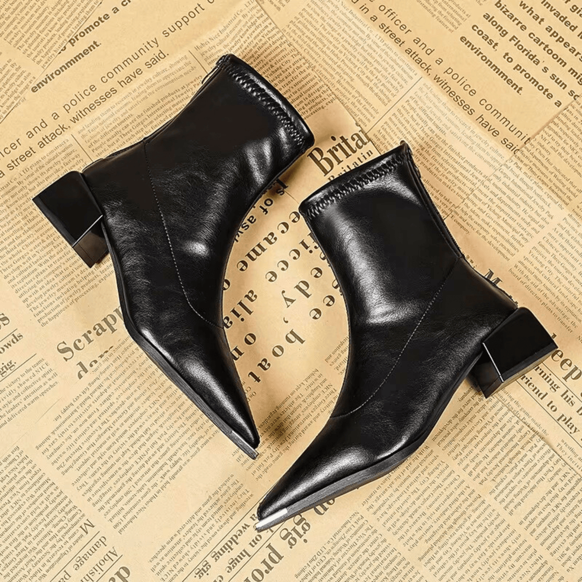 Aurelle – Stivaletti a punta con zip posteriore